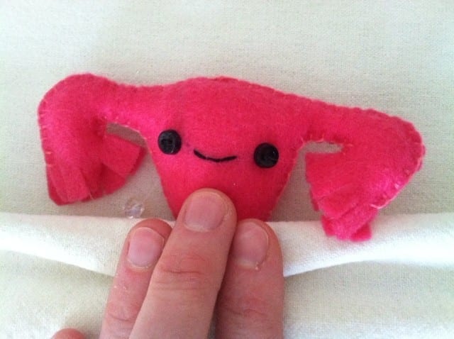 Massaging a toy uterus